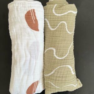 Two muslin baby blankets